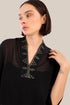 Loose fit embroidered short-sleeved top